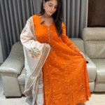 Trendy orange Mul Chanderi Anarkali suit set with mirror work and hand block printed mul chanderi duppata