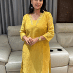 V neck hand work kurta and pant set in raw muslin silk fabric